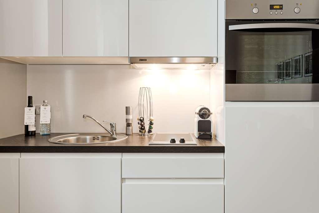 برلين شقق أرابيل البوتيكية المطعم الصورة A kitchen with a built-in oven